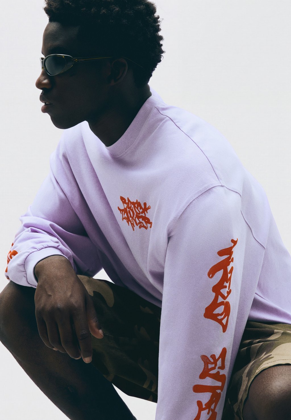 Long-sleeve top with graffiti graphic - purple